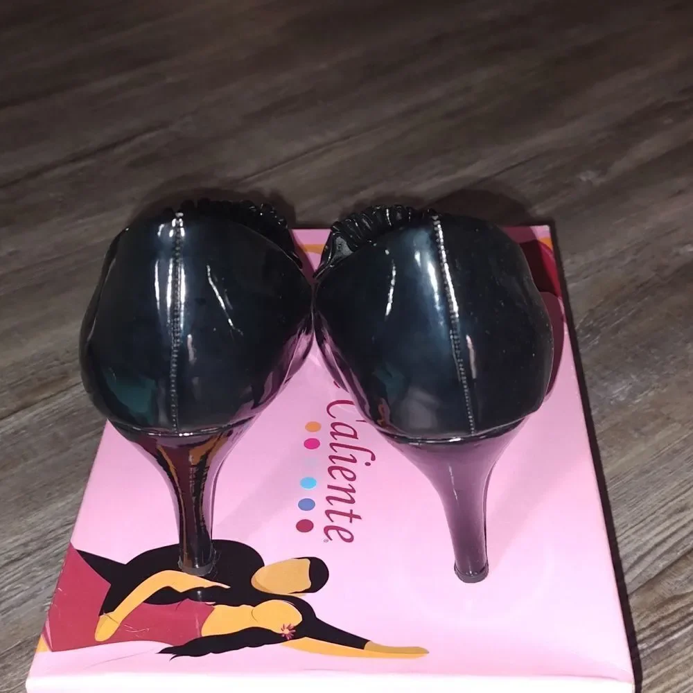 Torta Caliente black Emmy patent heels  Sz 9